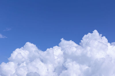 Low angle view of clouds in blue sky