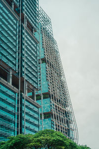 Low angle view of modern building against sky