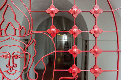 Archway seen through red design window