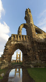 Low angle view of historical building against sky