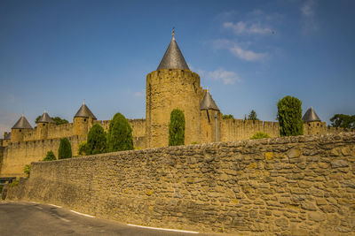 Low angle view of historical building against sky