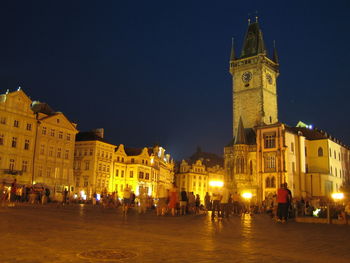 Group of people in city at night
