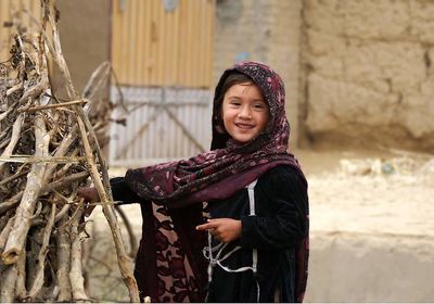 Portrait of a smiling young girl in winter