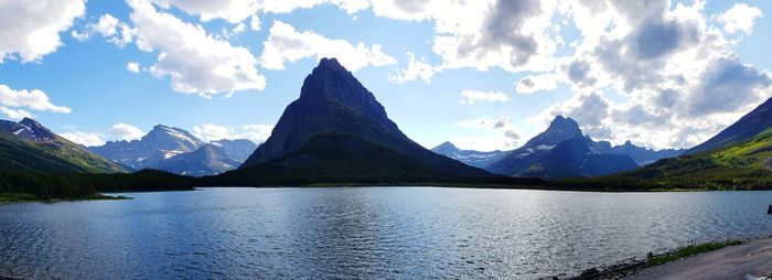 Panoramic view of lake and mountains against sky