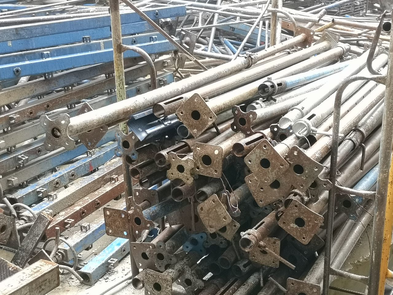 HIGH ANGLE VIEW OF MACHINE PART OF FACTORY
