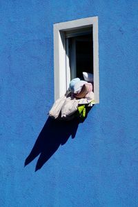 Man in front of building