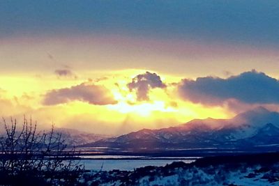 Scenic view of mountains at sunset