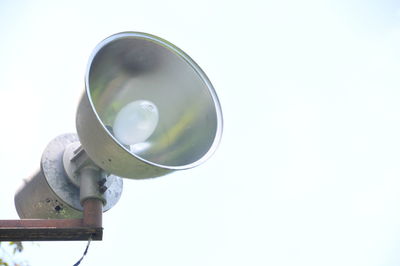 Low angle view of man hand against white background