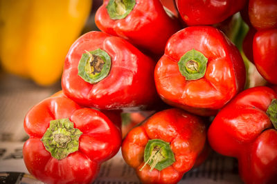 Close-up of red chili peppers on table