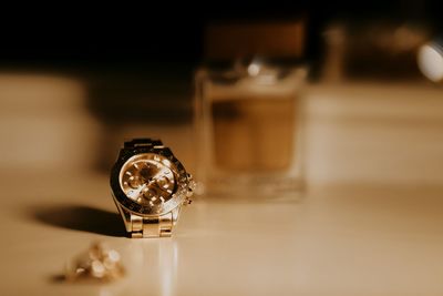 High angle view of clock on table