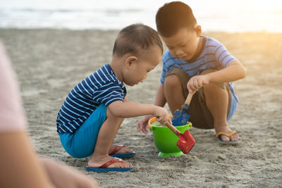 Boys playing on beach