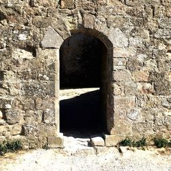 Low angle view of stone wall