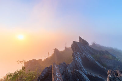 Scenic view of mountains against sky during sunset