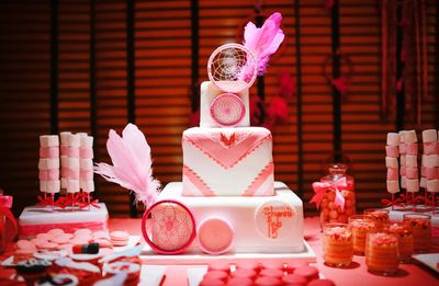 Layered birthday cake on table