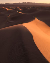 Scenic view of desert during sunset