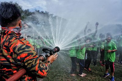 People standing in water