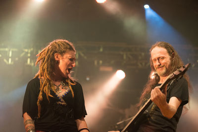 Friends enjoying music concert