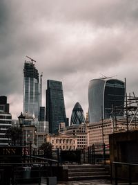 Modern buildings in city against sky