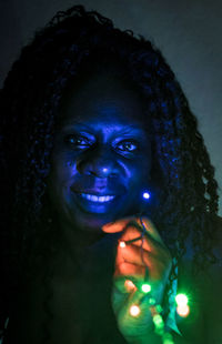 Portrait of woman with light painting