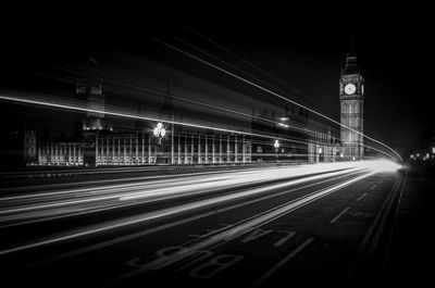 High angle view of light trails on road at night