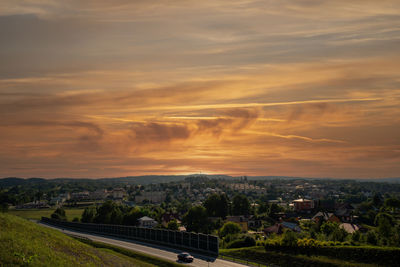 High angle view of buildings against sky during sunset