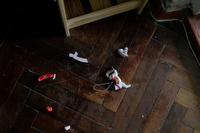 High angle view of girl lying on floor at home