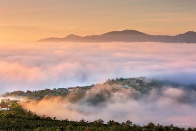 Scenic view of mountains against sky during sunset