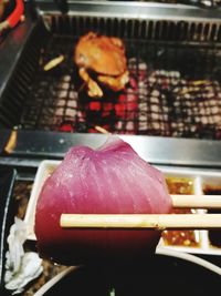 Close-up of meat on barbecue grill