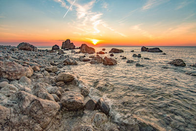 Scenic view of sea against sky during sunset