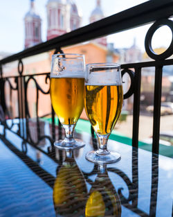 Close-up of beer glass on table