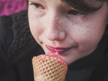 Close-up of boy eating ice cream