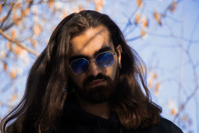 Portrait of young man wearing sunglasses