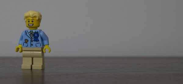Yellow toy on table at beach
