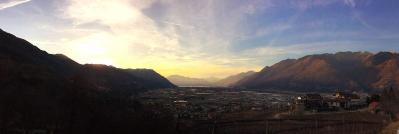 Panoramic view of mountains against sky during sunset