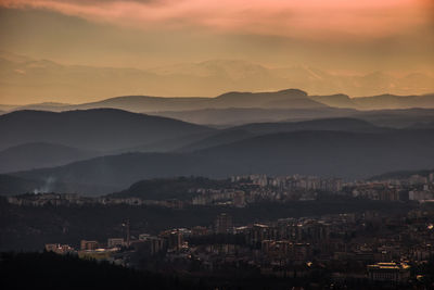 View of cityscape against sky during sunset