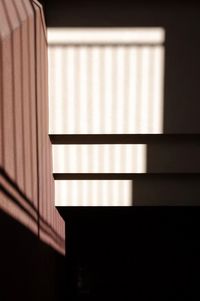 Low angle view of window on wall