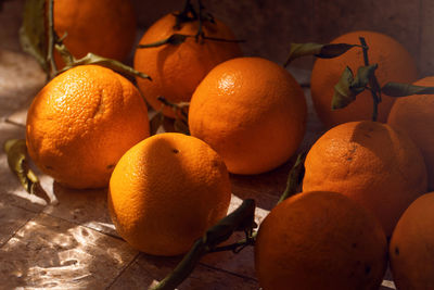 Close-up of oranges on table