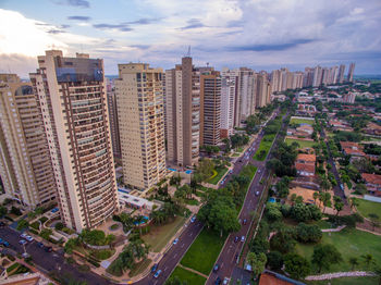 High angle view of buildings in city against sky