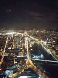 Illuminated cityscape at night