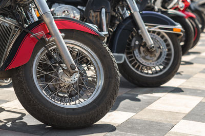 Close-up of bicycle parked on street