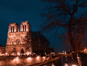 Illuminated buildings in city at night