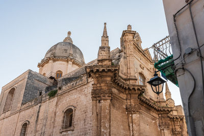 Low angle view of historical building against sky