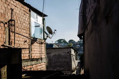 Low angle view of houses against sky