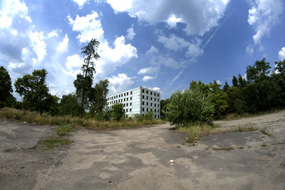 Built structure against cloudy sky