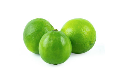 Close-up of fruits against white background