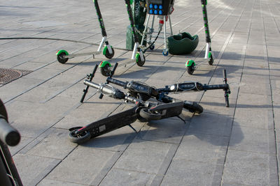 High angle view of bicycles on footpath