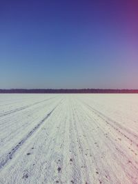 Scenic view of desert against clear sky