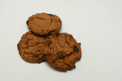 Close-up of cookies against white background