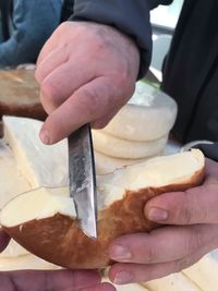 Close-up of hand holding ice cream