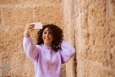 Young woman using mobile phone